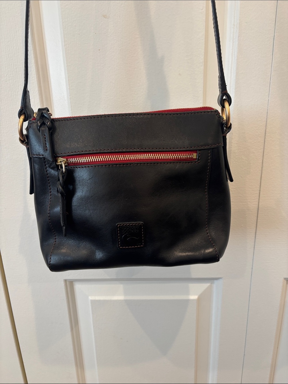Dooney & Bourke Black Leather Crossbody with Red Trim